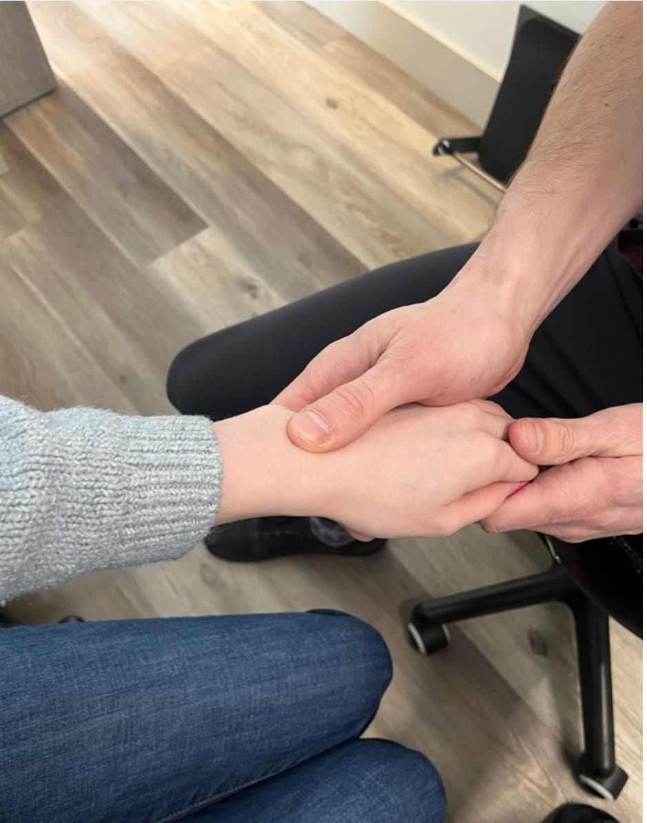 Edmonton Chiropractor performing spinal adjustment